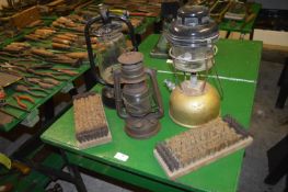 Three Hurricane Lanterns and Two Boot Brushes