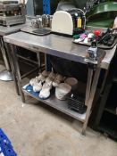 * S/S prep bench with upstand and undershelf, complete with bonza tin opener. 1000w x 500d x 600h