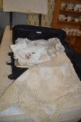 Travel Case Containing Vintage Linens and Textiles