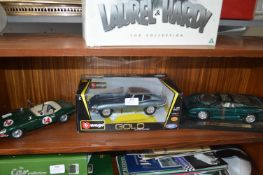 Three Diecast Jaguar Cas by Burago, Maisto, etc.