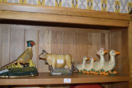 Three Cast Iron Decorative Doorstops