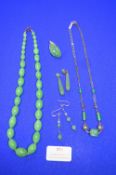 Two Jade Necklaces, Two Pairs of Earrings, and a P