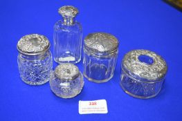 Five Glass Jars with Hallmarked Sterling Silver Li