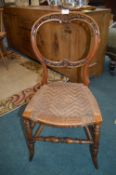 Carved Victorian Chair with Woven Seat