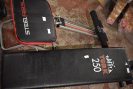 Steel Abs Exercise Machine and a York Bench