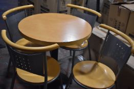 *Circular Bistro Table with Four Chairs