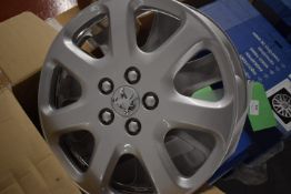*Four 16” Peugeot Plastic Wheel Trims
