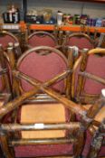 *Four Red Upholstered Carver Chairs on Wood Frames
