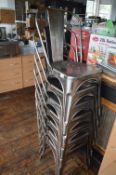 *Seven Stackable Metal Chairs