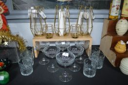 Six Champagne Glasses, Six Tumblers, and Five Cand