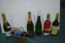 Six Bottles of Assorted Alcohol; Champagne, Wine,