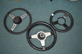Three Vintage Car Steering Wheels