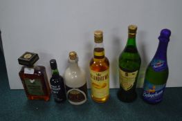 Six Bottles of Assorted Alcohol Including Disaronn