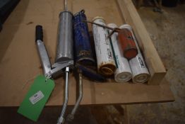 *Two Grease Guns and Three Tubes of Grease