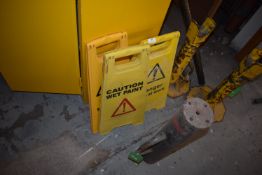 *Two Caution Men at Work Signs