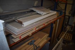 *Six Sheets of Plasterboard, a Door, and a Door Casing