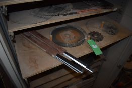 *Three Circular Saw Blades, One Cutter, and Four 2x400 Blades