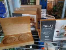 * wooden table stands with indents to hold sauce