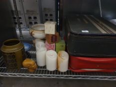 * collection of display items and vintage suitcases