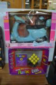 Barbie Vespa Scooter and a Rubik's Cube (both in o