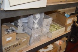 *Shelf of Various Decorative Items Including Flowe