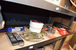 *Shelf of Remotes, Bike Chains, Brush Heads, Velcr