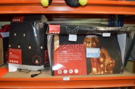 *Festoon Lighting, Fluffy Dog Characters, and Glit