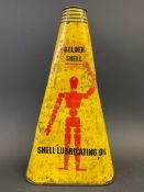 A Shell Lubricating Oil 'Golden Shell' quart triangular can with robot/stick man motifs.