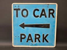 A 'To Car Park' directional double sided cast aluminium sign, 21 x 21