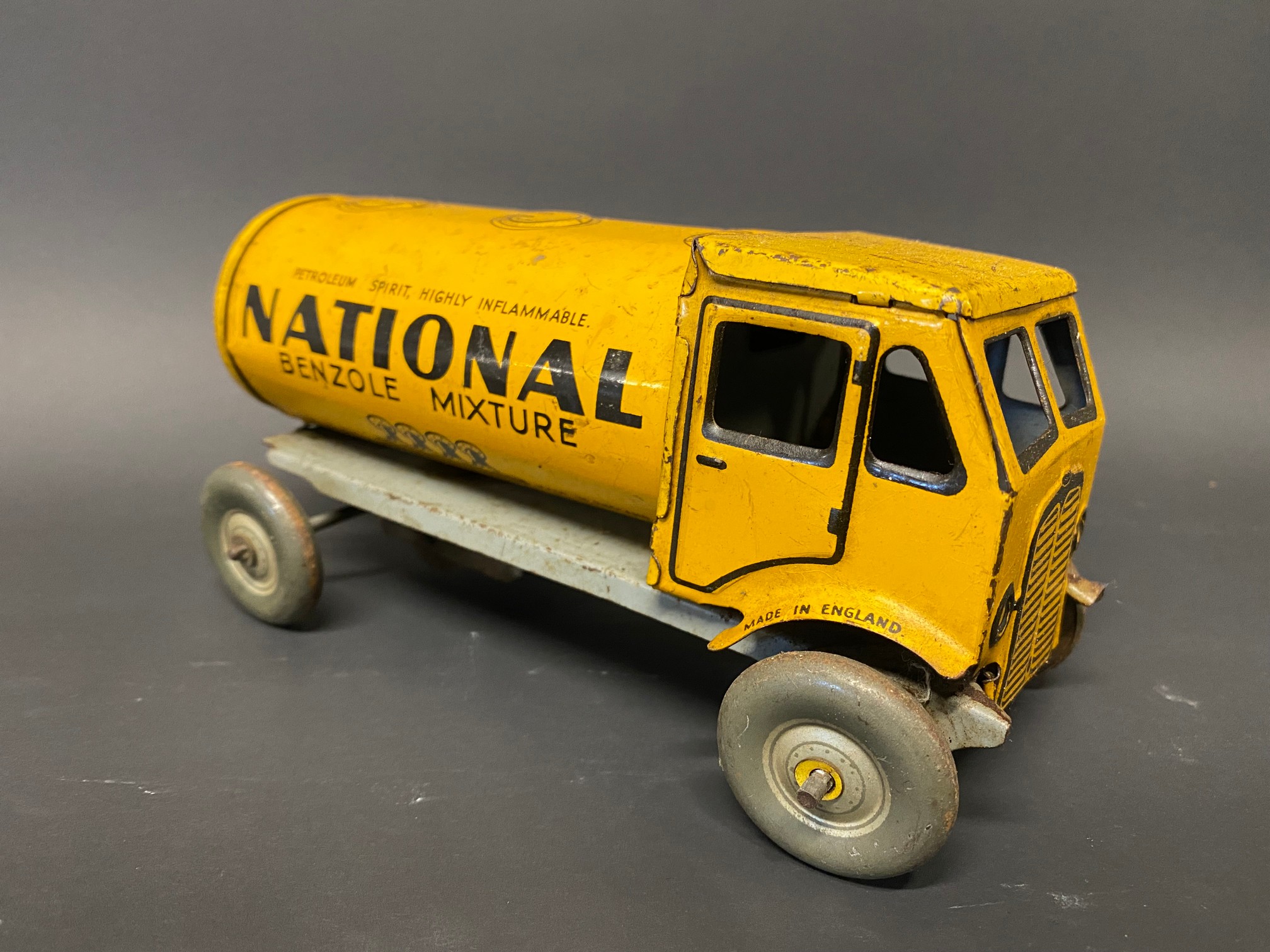 A clockwork tinplate model of a petrol tanker in National Benzole Mixture livery. - Image 2 of 4