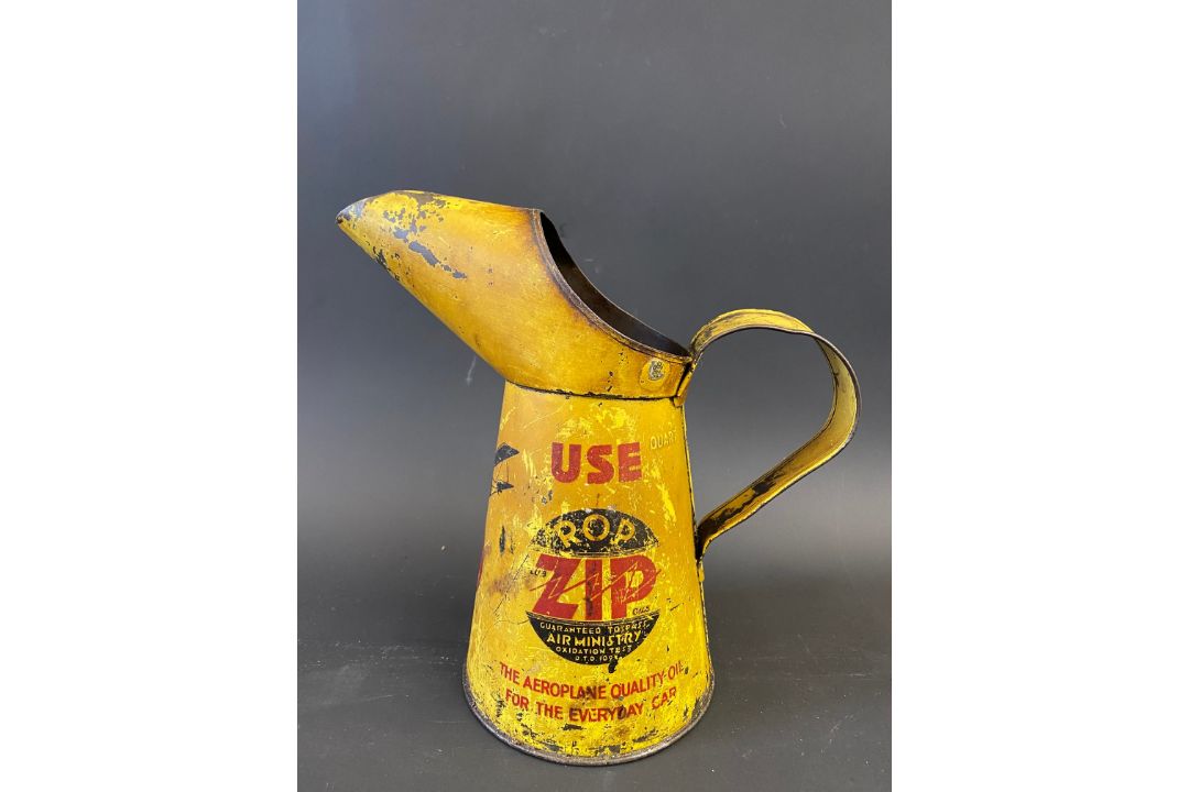 An ROP ZIP quart measure. - Image 1 of 5