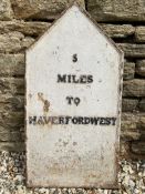 A cast iron mileage marker '5 miles to Haverfordwest', 15 1/2 x 30