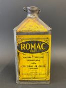 A Romac Upper Cylinder Lubricant pyramid can.