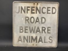 An aluminium road sign 'Unfenced Road Beware Animals', 21 x 21