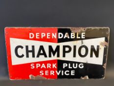 A Champion Dependable Spark Plug Service rectangular enamel sign, dated 1951, 23 x 13