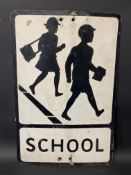 A metal road sign warning of a School, 14 x 21