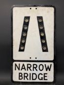 A metal road sign for Narrow Bridge with integral glass reflectors, 12 x 21