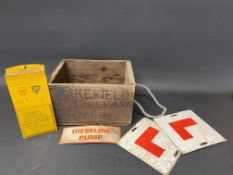 A Wakefield Castrolease wooden packing box, a Shell BP tin wall mounted rack, two metal 'L' plates