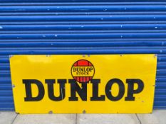 A Dunlop Stock rectangular enamel sign with good gloss, by Jordan of Bilston, 54 x 24