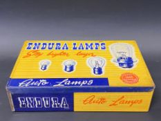 An Endura Auto Lamps rectangular lidded tin in good conditon.