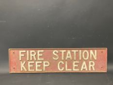 A Fire Station Keep Clear cast iron sign, 30 1/2 x 7 1/2