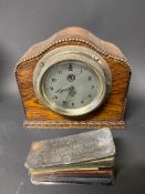 A Smiths silver faced eight day car clock with MG emblem to the dial, plus an original colour swatch