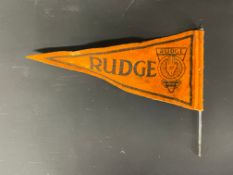 A felt pennant advertising Rudge.