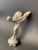 A Rolls-Royce spirit of ecstasy mascot, appears newly cast and not finished.