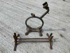 An ornate bicycle stand and one other.
