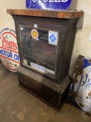A mahogany counter top display cabinet, as removed from a garage, 24 3/4