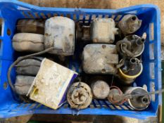 A box of cut outs, coils and SU fuel pumps.
