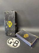 An AA First Aid Outfit tin with contents, an AA box and an AA GB plate.
