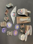 A collection of Morris radiator and bonnet badges etc.