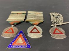 Three silver and enamel Safe Driving Competition 5 Years Driver's Award badges, two with year bars